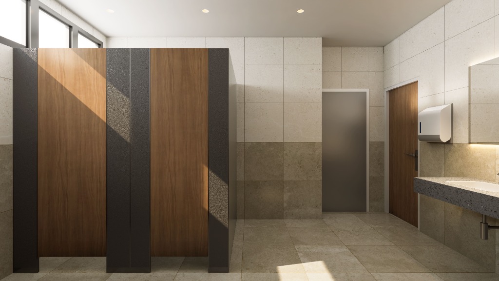 Long commercial restroom vanity with stone sinks